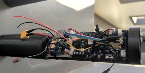 Avionics Bay Configuration showing ESP32, sensors, and battery within the 3D-printed enclosure.